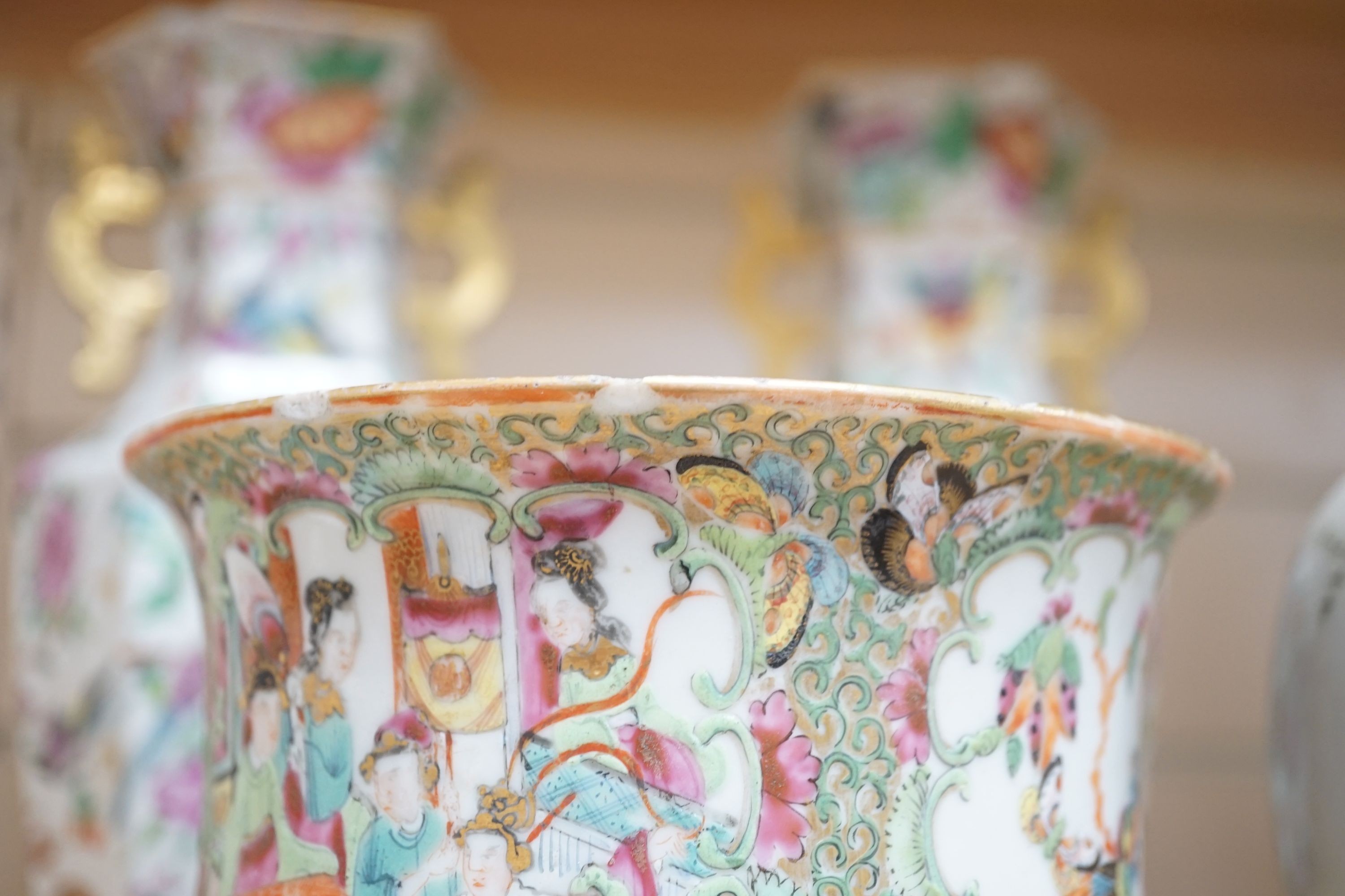 A group of 19th-century Chinese enamelled porcelain vessels, to include a jar, a pair of hexagonal vases, a pot and a cricket cage, Pair of vases 22cm high.